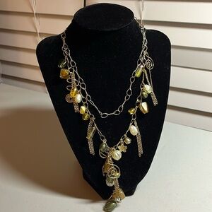 Charm necklace with earth, tone beads